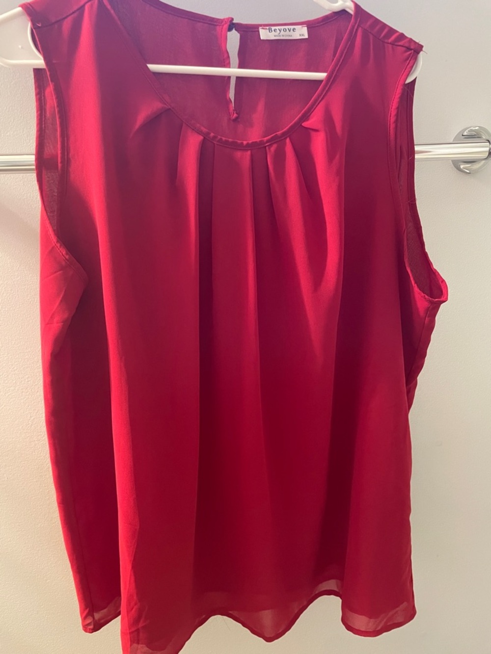 Red Sleeveless Pleated Blouse